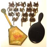 Approximately sixteen Indian metal toe rings and two vintage mirrors,