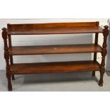 An early 20th century mahogany breakfast bar, three shelves on turned supports, 100 x 150cm.