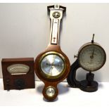 A modern oak barometer, a mahogany pressure gauge and a Louis Shopper Leipzig paper micro meter (3).