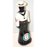 A 750ml bottle of Barbados Doorly's rum in a bottle modelled as a Harbour Policeman.