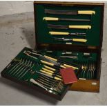 A near complete oak cased canteen of Walker & Hall silver plated cutlery comprising approx sixty