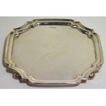 An Elizabeth II hallmarked silver Walker & Hall salver, the stepped sides with re-entrant corners,