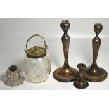 A George V hallmarked silver candlestick, Birmingham 1910, a pair of silver plated candlesticks,