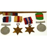 Four WWII medals relating to a Mr E.