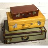 A vintage gentlemans travelling suitcase with integral fold out hanging compartment,