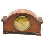 An early 20th century mahogany cased mantel clock, the gilded dial set with Arabic numerals,