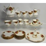 A quantity of Royal Albert "Old Country Roses" pattern teaware to include cups, saucers, teapot,