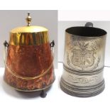 A brass and copper coal bin and a large commemorative mug inscribed "Queens College Trial eights