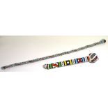 An African beadwork walking stick, length 86cm and a smaller, shorter example, length 36cm (2).