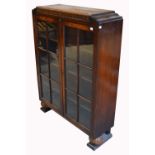 An Edwardian oak glazed bookcase,