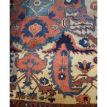 A late 19th early 20th century Middle Eastern orange ground carpet, approx 305 x 230cm.