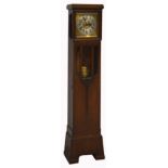 A 20th century oak grandmother clock, metal dial set with Arabic numerals, height 70cm.