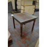 An oak drawleaf table with part painted decorated top and applied transfers to the legs.