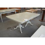 A pale green painted twin pedestal dining table with rounded rectangular top, length 163cm.