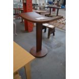 An unusual display table designed by Oscar Niemeyer, Addition Rinck 11/100, dated 2009,