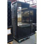 A black painted shop display cabinet with mirrored back and twin cupboard doors, width 100cm.