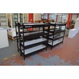 A set of four sets of display shelves, each with square section end supports, length 123cm.