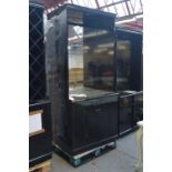 A black painted shop display cabinet with mirrored back and twin cupboard doors, width 100cm.