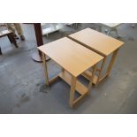 A pair of chipboard side tables, top 71cm.