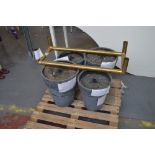 Four weighted Christmas tree bases and a metal tubular frame (5).