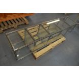 A metal framed and glazed set of display shelves with four fixed glass shelves, width 43cm.