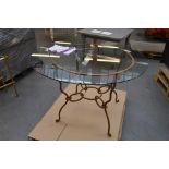 A gilt metal framed circular centre table with circular glass top, diameter 120cm.