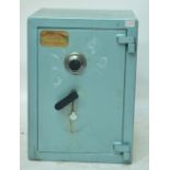 A sky blue painted safe with key and combination lock, width 46cm.