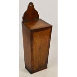 A late George III oak and mahogany crossbanded candle box with tapering rectangular body,