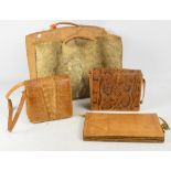 A large leather and fur holdall, a 1920s alligator skin handbag, a python handbag,