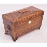 An early 19th century mahogany boxwood strung and crossbanded sarcophagus tea caddy,