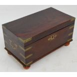 A George III mahogany and brass bound campaign tea caddy with recessed side carrying handles, hinged