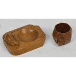 ROBERT "MOUSEMAN" THOMPSON; a carved oak ashtray 7 x 7.5cm and a napkin ring, width 4cm. CONDITION