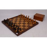 A Staunton loaded chess set, in original box, retaining majority of paper label, red crown to one