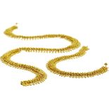 Gold-Collier und -Armband Gelbgold ca. 585. Im indischen Stil. Das Collier hat eine Länge von 39 cm.