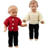 Puppen-Zwillinge Schildkröt-Puppen Mitte 20. Jh. Bekleidete Zelluloid-Puppen "Nr. 29 / T 28". Höhe