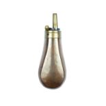 A pear shaped copper powder flask, brass spring top with fixed nozzle, the body canted sides.
