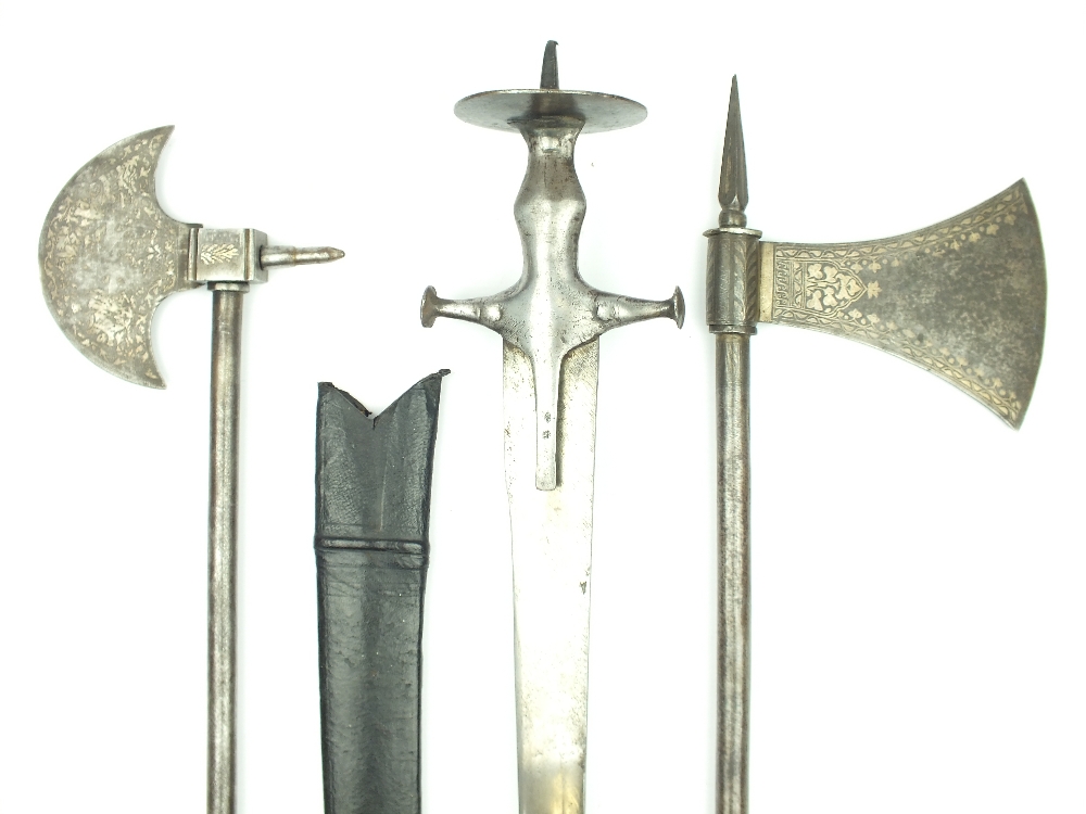 Two Late 19th Century Indian Axes and a Tulwar, the first axe 71cm over all length, 12cm diameter