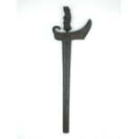 A Malayan Kris, 435.cm watered steel blade, characteristic carved wooden hilt in the form a God,