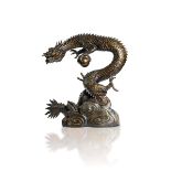 A LARGE BRONZE OKIMONO OF A DRAGON
Japan, Meiji period (1868-1912). Height 58 cm.
Naturalistically