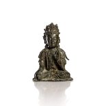 A SEATED BRONZE FIGURE OF GUANYIN
China, Ming dynasty (1368-1644). Height 20.5 cm.
The figure seated