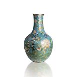 A LARGE CLOISONNÉ ENAMEL BOTTLE VASE
China, Qing dynasty. Height 71 cm.
The body decorated with