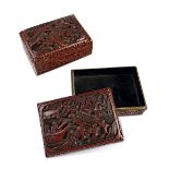 TWO RECTANGULAR CINNABAR LACQUER BOXES AND COVERS
China, Qing dynasty. Width 11 cm.
  Reserve price: