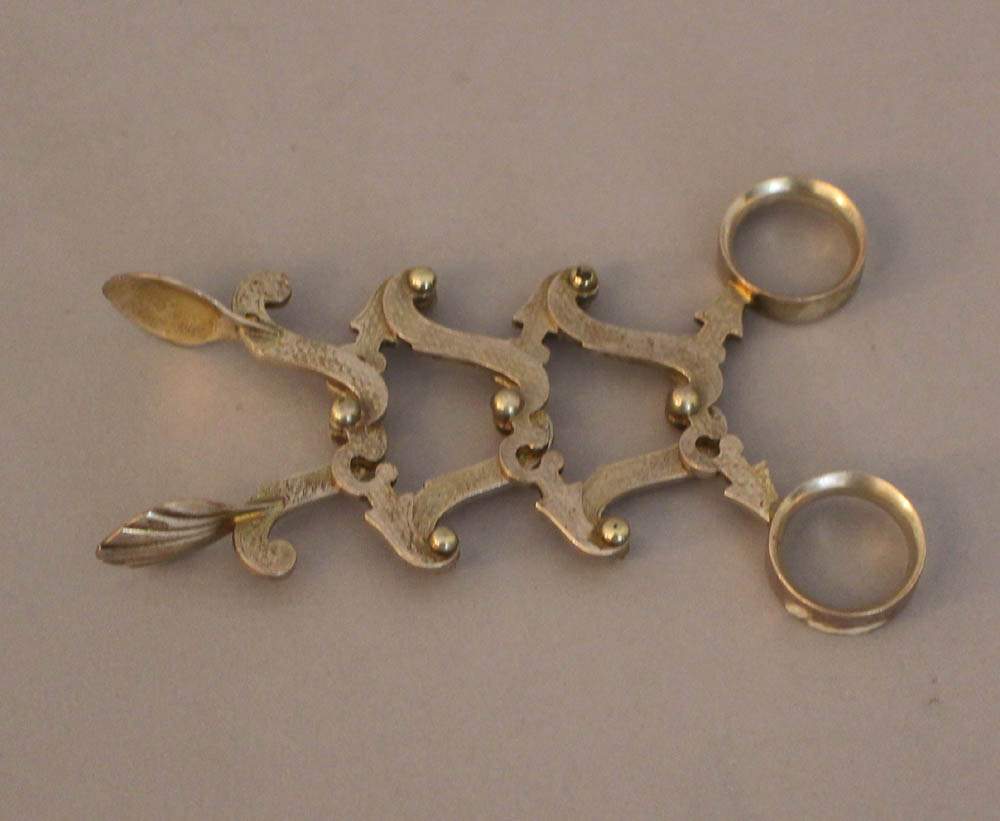 Vienna silver sugar tongs with two finger grips and shaped arms with mechanic ending in two - Image 2 of 3