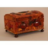 German amber jeweller's casket, in rectangular form with rounded lid. The wooden casket decorated