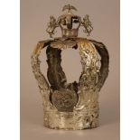 Torah Crown with two lions holding a crown with bells on top, crowned by an eagle, with chased and