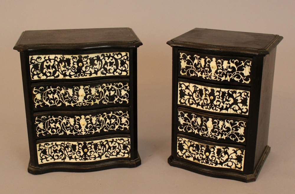 Two miniature commodes, each with four shaped and bowed drawers, canted corners and round stepped