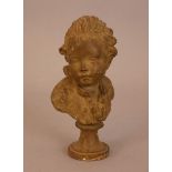 French terracotta bust of a young boy, on integrated round terracotta base and sculpted, with