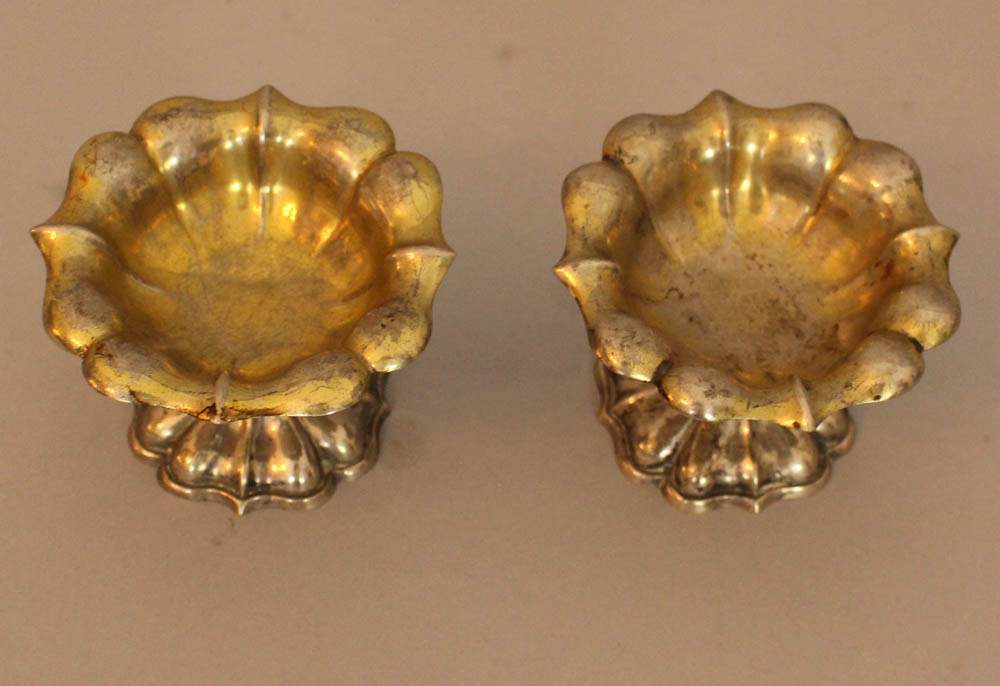 Pair of silver salt and pepper spenders in shaped floral design, each on one foot, with traces of - Image 2 of 3