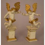 Pair of small baroque flying angels, wooden carved with depthly carved cloth, hair and wings,