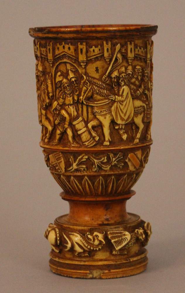 Ivory baker in medieval manner with carved decorations of knights, a king and soldiers in front of a - Image 2 of 3